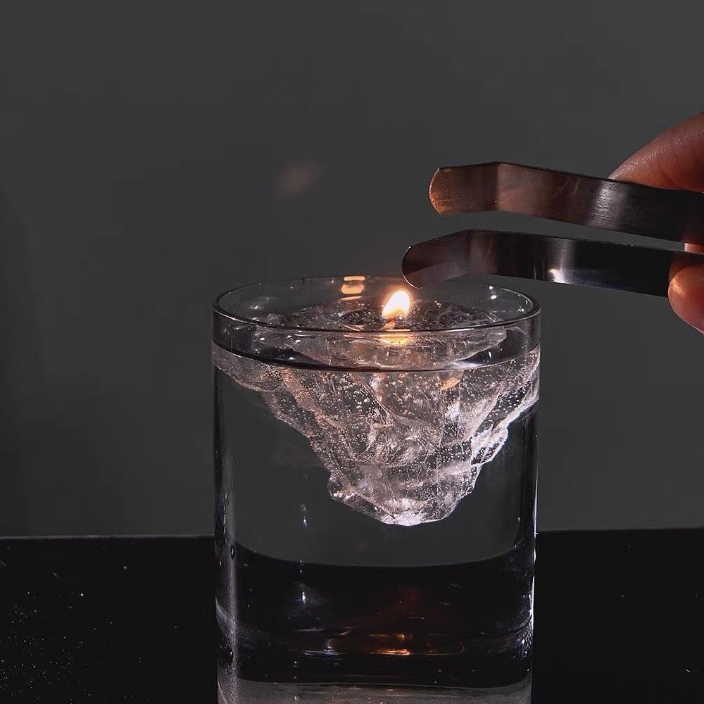 Elegant, romantic, handmade transparent 3D floating iceberg made of jelly wax, clear wick.